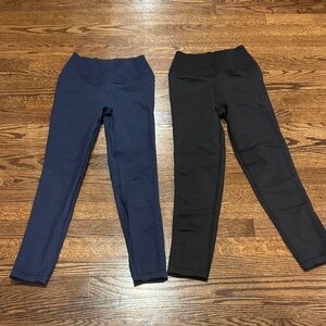 Two pairs of Aerie Offline Leggings in Navy and Black Size Small